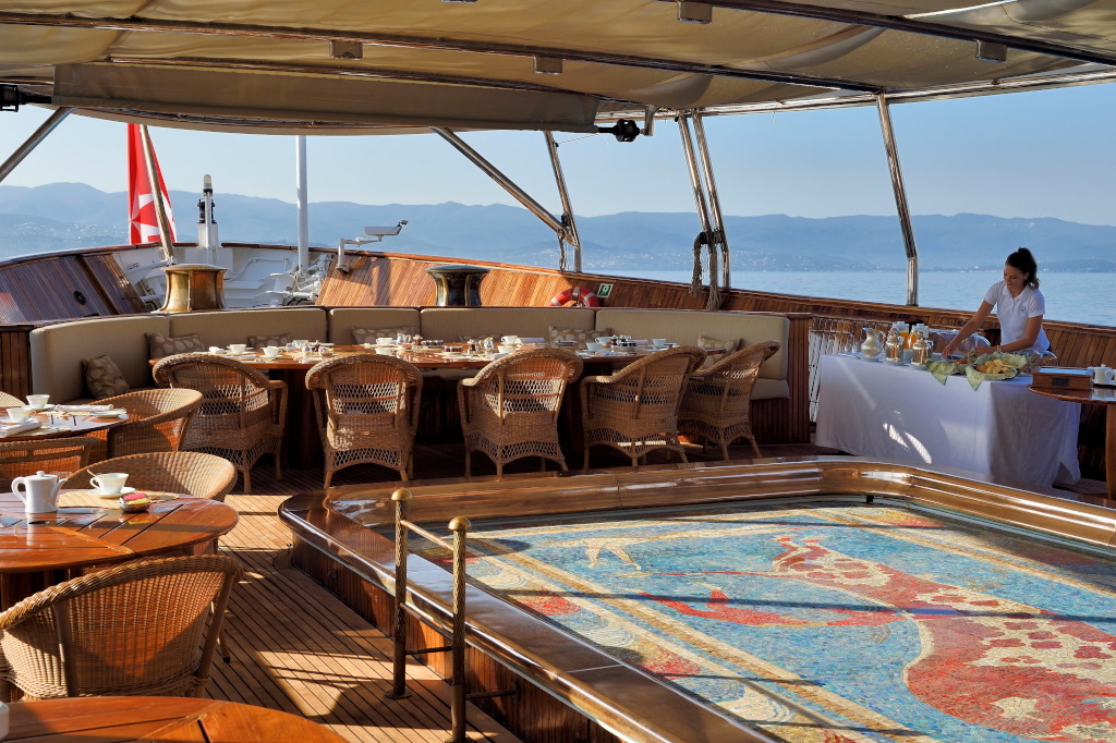 Breakfast at the swimming pool aboard superyacht